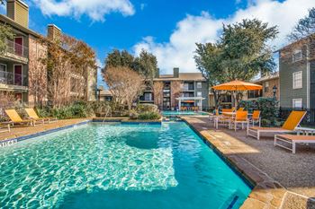 Swimming pool with lounge seating